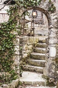 Italian street detail with an old-fashioned lamp in Barrea