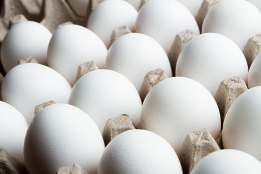 Bunch of eggs still sitting in their tray