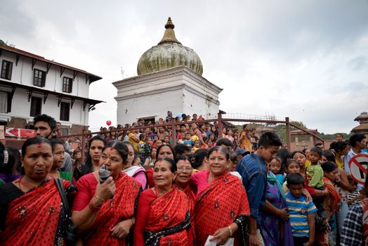 NEPAL, Patan: The Bunga Dyah Jatra chariot festival continues in Patan, Nepal on September 26, 2015, drawing thousands of devotees to honor the Buddhist deity of compassion Avalokitesvara, who is also known as Rato Machhindranath and the giver of rain.