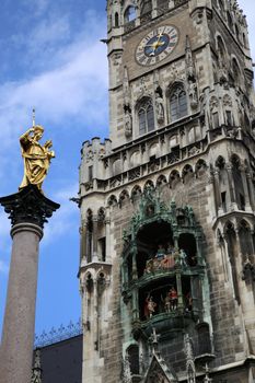 The Golden statue of Mary (Mariensaule), a Marian column on the Marienplatz in Munich, German