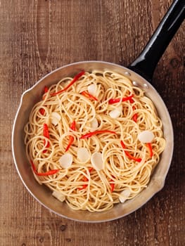 close up of rustic traditional italian aglio olio spaghetti pasta