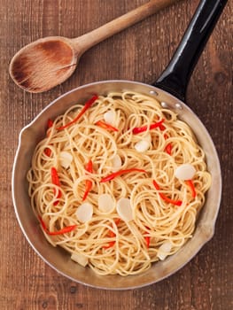 close up of rustic traditional italian aglio olio spaghetti pasta