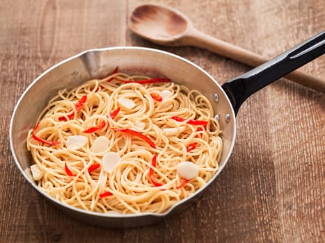 close up of rustic traditional italian aglio olio spaghetti pasta