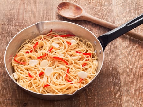 close up of rustic traditional italian aglio olio spaghetti pasta