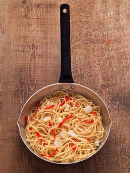 close up of rustic traditional italian aglio olio spaghetti pasta