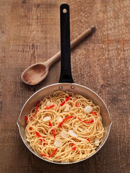 close up of rustic traditional italian aglio olio spaghetti pasta