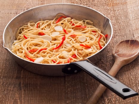 close up of rustic traditional italian aglio olio spaghetti pasta