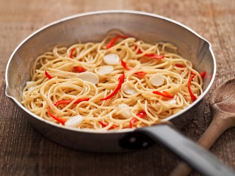 close up of rustic traditional italian aglio olio spaghetti pasta