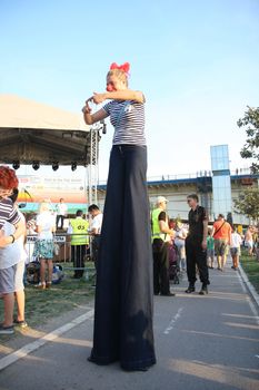 Entertainers  on stilts at Belgrade Boat Carnival held on Avgust 29 2015 at Belgrade,Serbia