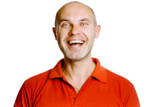Unshaven laughing blue eyes middle-aged man in a red T-shirt. Studio. isolated