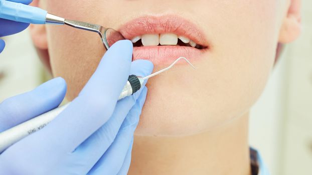 Close-up of a pretty patient with her mouth open