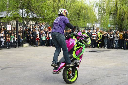 Moto free style pilot stunting on the square - Pyatigorsk, Russia, Opening of moto season 2015 on 1st May 2015