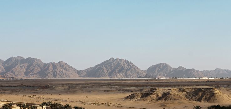 Egyptian Desert And Mysty Sky In The Daylight