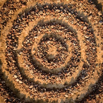 Zen meditation of rock garden concept. Concentric circles of small stones