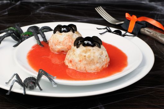 chicken meatballs in tomato gravy on the table in honor of Halloween