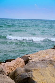 Rough seas seen from the rocks near the beach in Jesolo, Italy