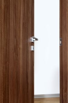 colored wooden door open, with the handle, on white background