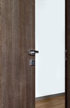 colored wooden door open, with the handle, on white background