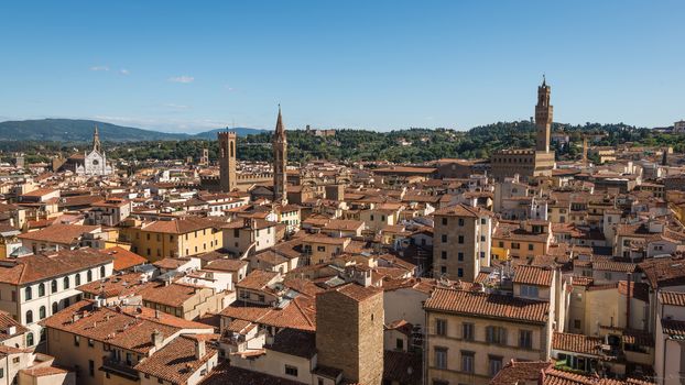 In the picture an aerial view of the old town of Florence