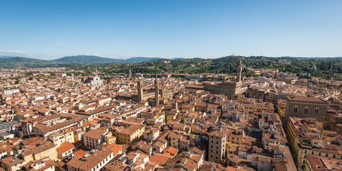 In the picture an aerial view of the old town of Florence