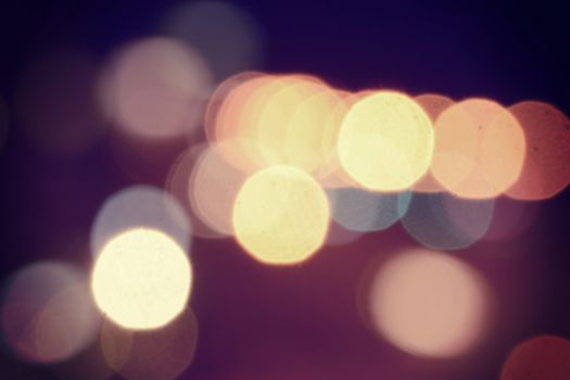 Blur bokeh lights with vintage retro style effect background.