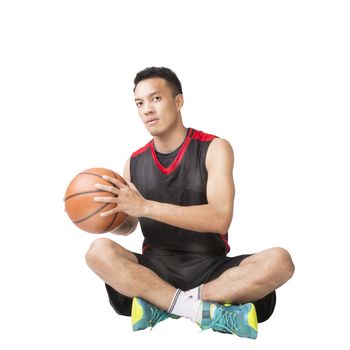 Asian young basketball player on white background