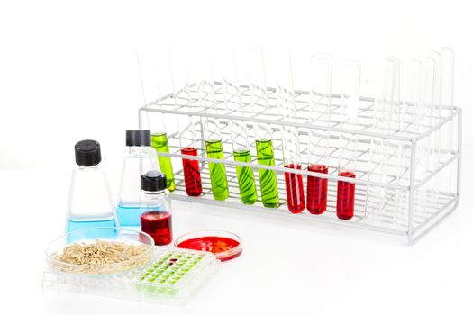 Laboratory science lab equipment containing colored liquids experiment