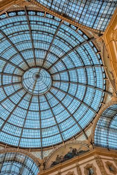 MILAN - SEPTEMBER 25, 2015: Walls of Galleria Vittorio Emanuele. Milan attracts 5 million people annually.