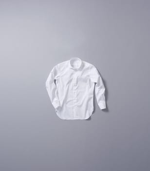 simple and beautiful white shirt on the gray background