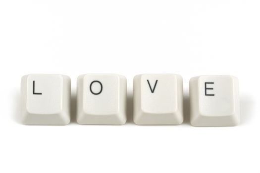 love text from scattered keyboard keys isolated on white background