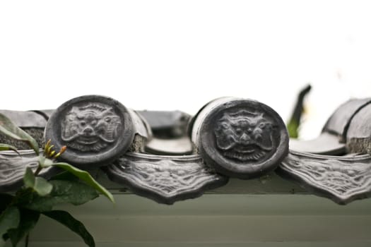 Chinese temple decoration detail with leaves