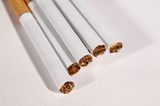 group of cigarettes on white background