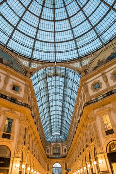 MILAN - SEPTEMBER 25, 2015: Walls of Galleria Vittorio Emanuele. Milan attracts 5 million people annually.