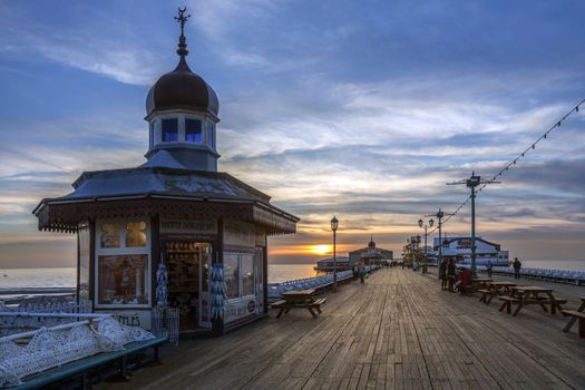 The old North Pier at sunset in Blackpool on the northwest coast of England.