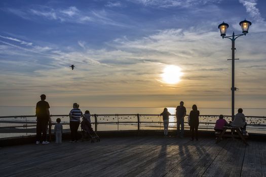 The old North Pier at sunset in Blackpool on the northwest coast of England.