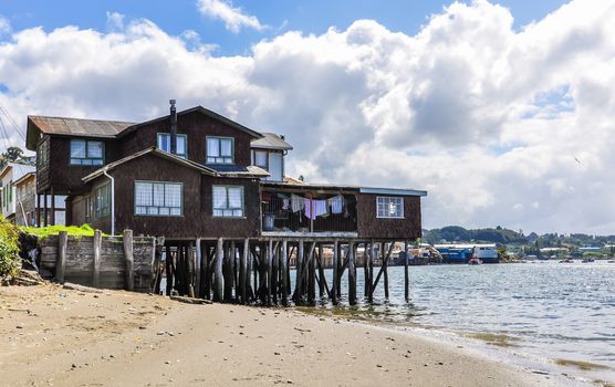 Houses standing on small columns, Chiloe Island, Patagonia, Chile