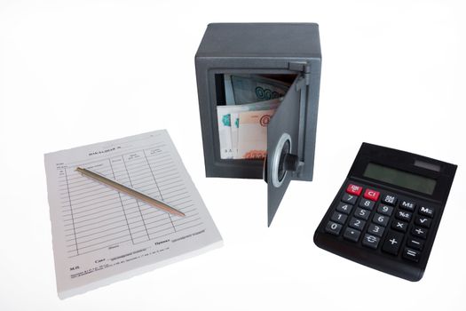 The photo depicts a safe with money and documents.