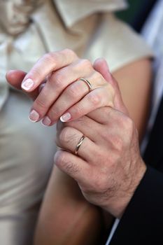 The groom keep the bride for hands