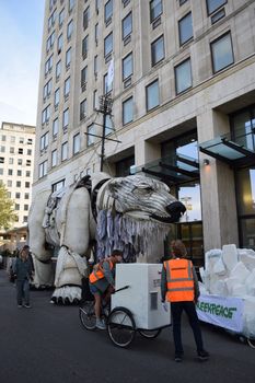 UNITED KINGDOM, London: Aurora the polar bear outside Shell HQ	Actress Emma Thompson joined John Sauven, director of Greenpeace, and a number of activists and other members of the public outside Shell's Headquarters in London on September 29, 2015 to celebrate the announcement that Shell had abandoned its plans to drill for oil in the Arctic.  	According to our contributor about 50 to 100 people listened as Sauven and Thompson spoke of the victory and their continuing fight, which would see their puppet polar bear Aurora being relocated to Paris. 