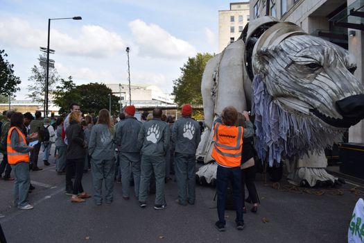 UNITED KINGDOM, London: 	Actress Emma Thompson joined John Sauven, director of Greenpeace, and a number of activists and other members of the public outside Shell's Headquarters in London on September 29, 2015 to celebrate the announcement that Shell had abandoned its plans to drill for oil in the Arctic.  	According to our contributor about 50 to 100 people listened as Sauven and Thompson spoke of the victory and their continuing fight, which would see their puppet polar bear Aurora being relocated to Paris. 