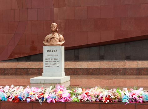 Cemetery of revolutionary. Bust on the grave of Kim Jong Suk