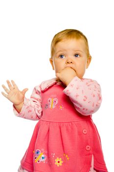 Beautiful baby girl standing. Studio photo. isolated