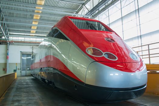 a train ready to exit from the workshop