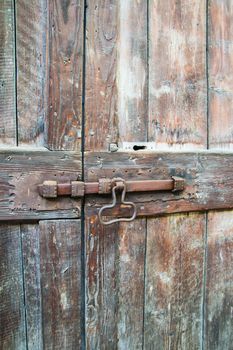 deadbolt on old wooden door