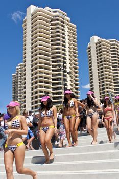 GOLD COAST, AUSTRALIA - OCTOBER 2: Unidentified participants prepare for march of successful Guinness World Record longest bikini parade on October 2,2011 in Gold Coast, Australia.