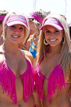 GOLD COAST, AUSTRALIA - OCTOBER 2: Unidentified participants prepare for march of successful Guinness World Record longest bikini parade on October 2,2011 in Gold Coast, Australia.