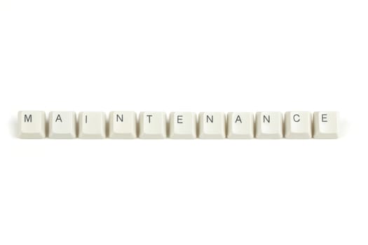 maintenance text from scattered keyboard keys isolated on white background
