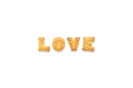 Collage of the capital letters word LOVE. Alphabet cookie biscuits isolated on white background