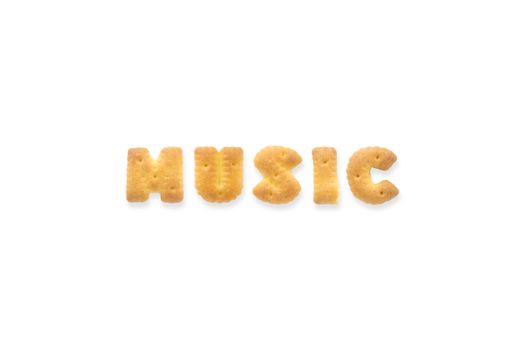 Collage of text word MUSIC. Alphabet biscuit cracker isolated on white background