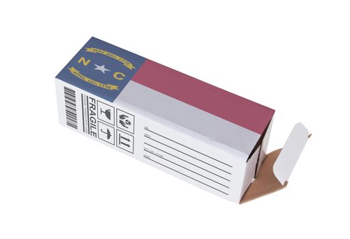 Concept of export, opened paper box - Product of North Carolina